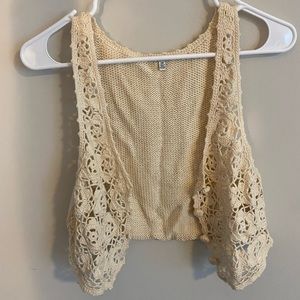 Small, beige, beach cover up or cardigan